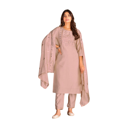 Woman wearing a light pink traditional outfit with a dupatta on a white background